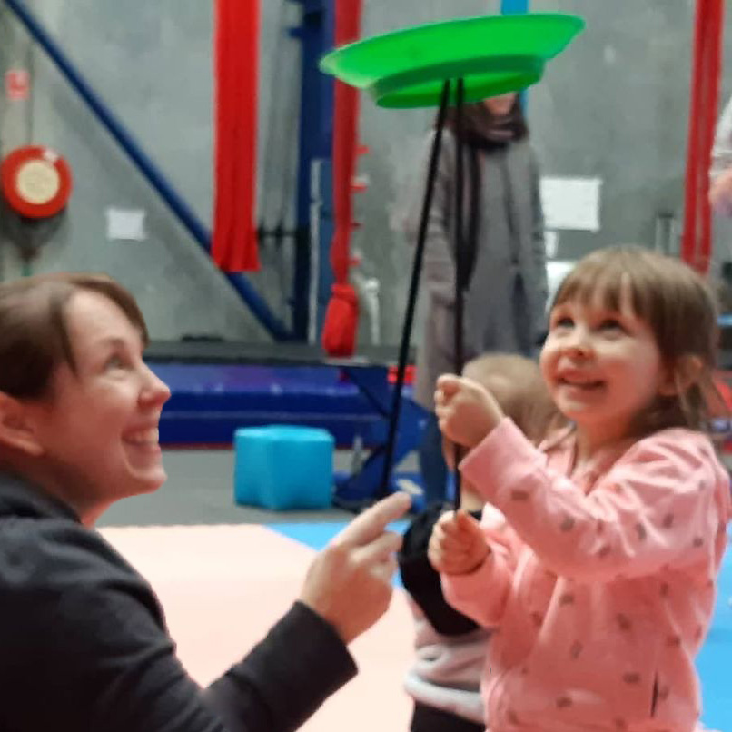 Mother and Daughter plate spinning in circus class